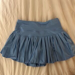 Light blue gold hinge skirt
